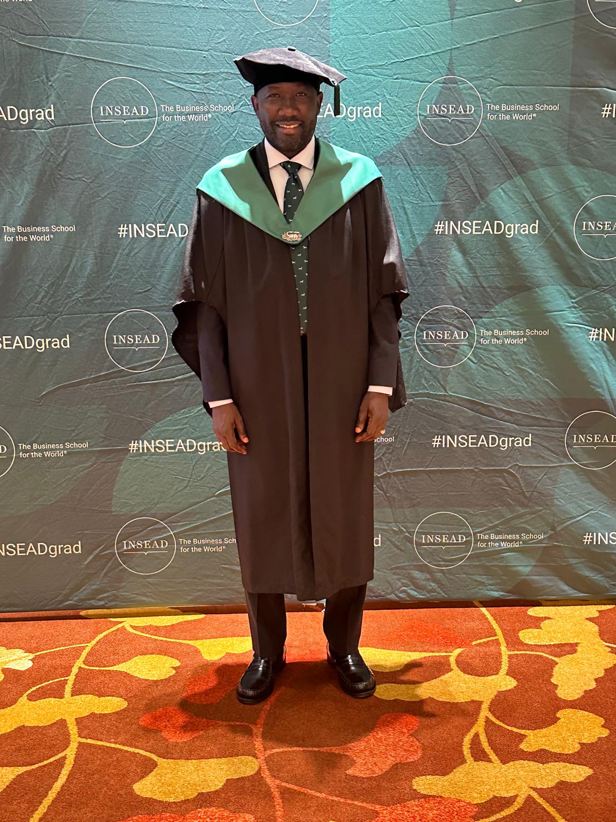 INSEAD graduation portrait in academic regalia